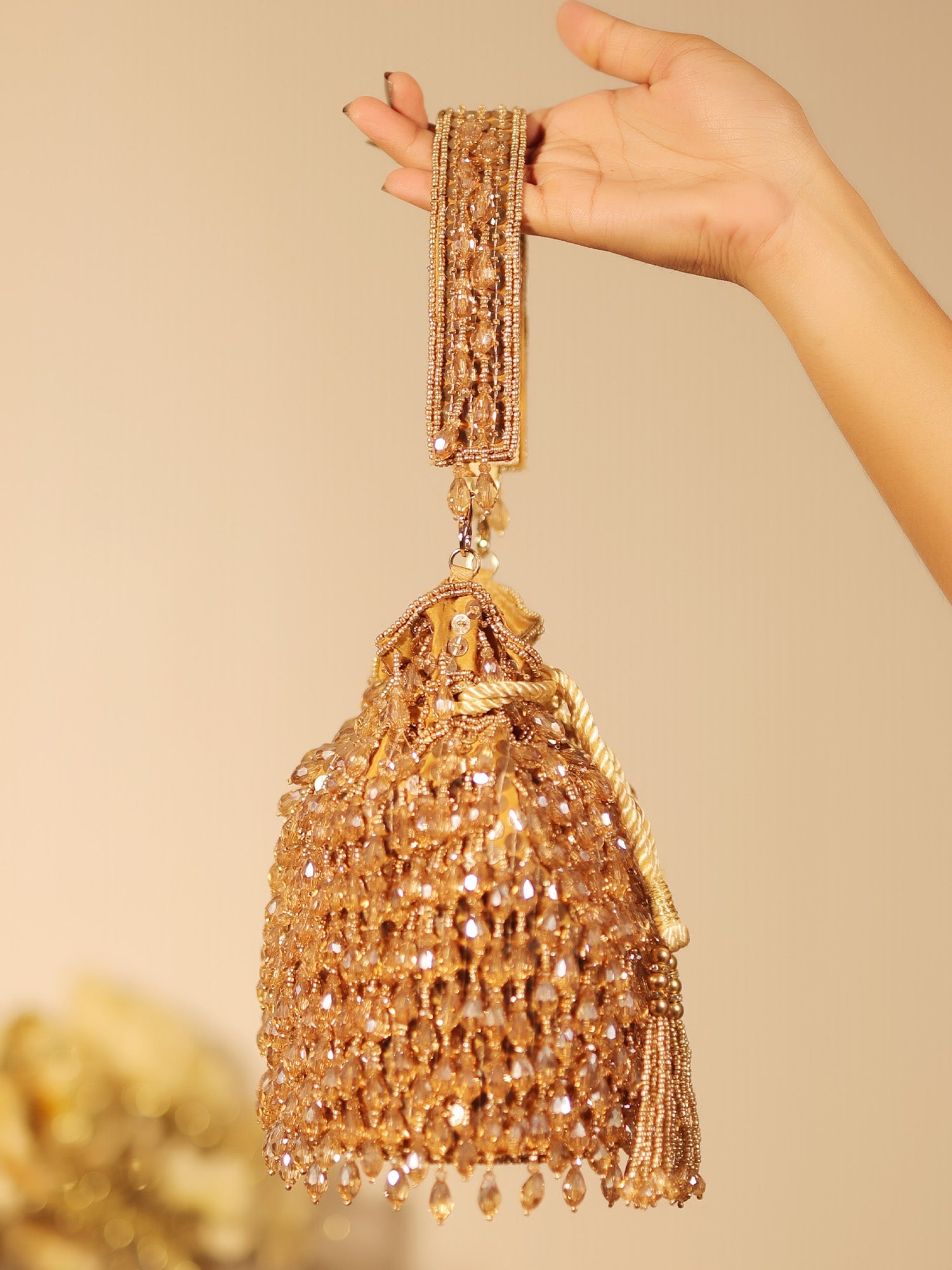 Jayla Golden Potli Bag