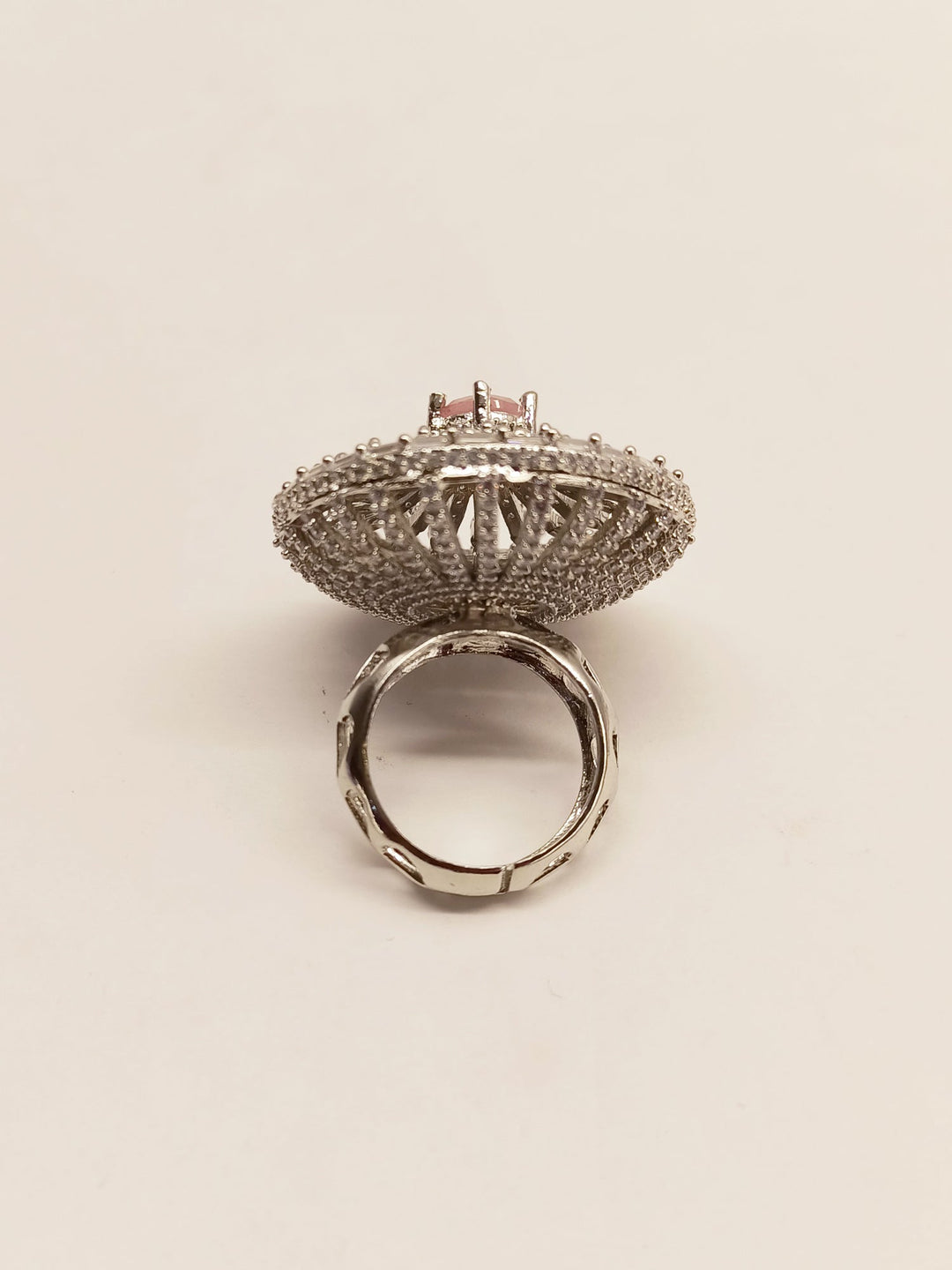 Beautiful round baby pink silver ring with intricate Nilambari design