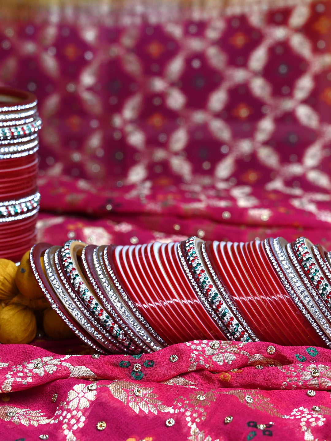 Traditional red and white Punjabi Chura Set with intricate designs