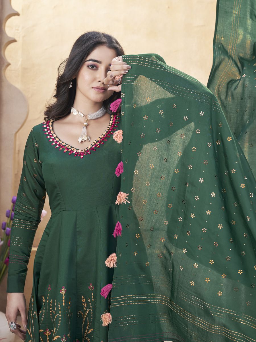 Green Roman Silk Mirror Work and Foil Print Salwar Suit, top made from Roman Silk, with mirror work and foil print, 50-inch length Bottom made from Roman Silk, 39-inch length Dupatta also made from Roman Silk, 230 MTR length