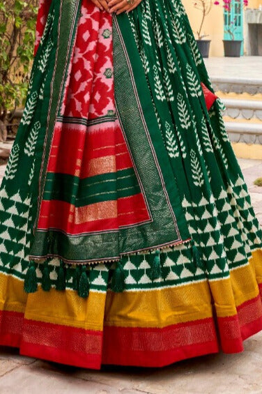 Adorned in printed Tusser silk lehenga choli in Green Color