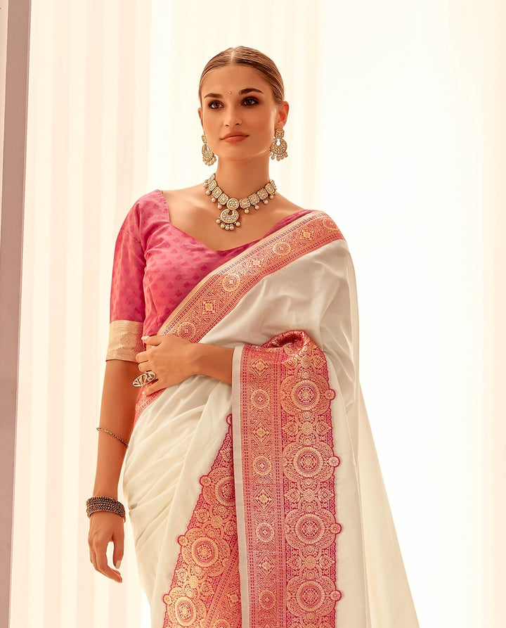 Elegant white silk saree with detailed contrast big border weaving