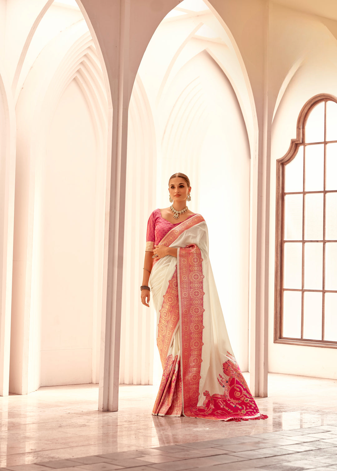 Traditional Indian saree in white silk with beautiful border weaving