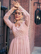 Pretty-Baby-Pink-Embroidered-Georgette-Readymade-Palazzo-Suit-on-model-during-summer-outdoor-event
