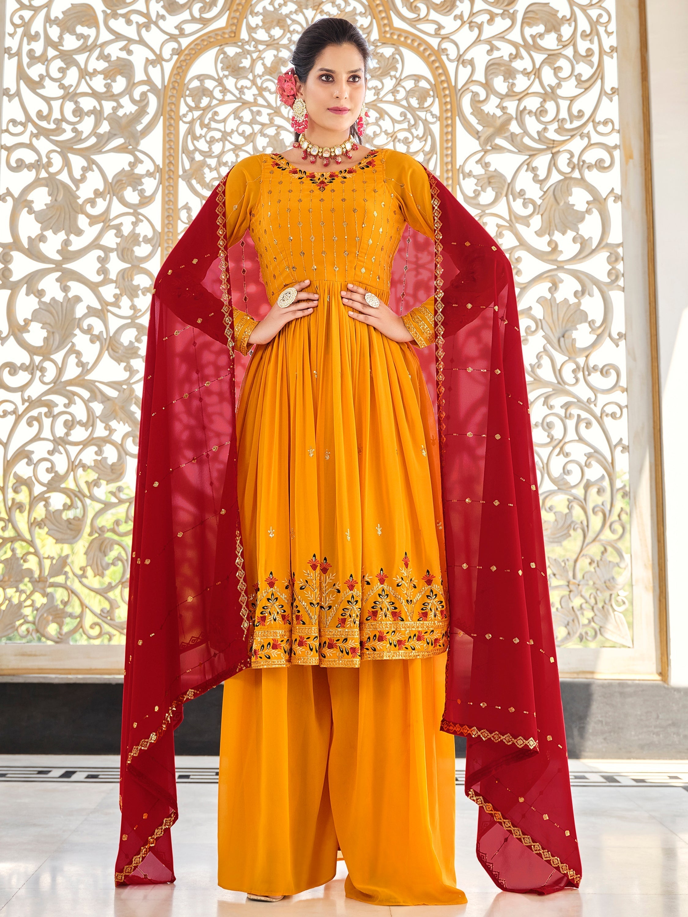 
Lovely Mustard Sequins Georgette Traditional Salwar Kameez with stunning sequins work and thread embroidered details
