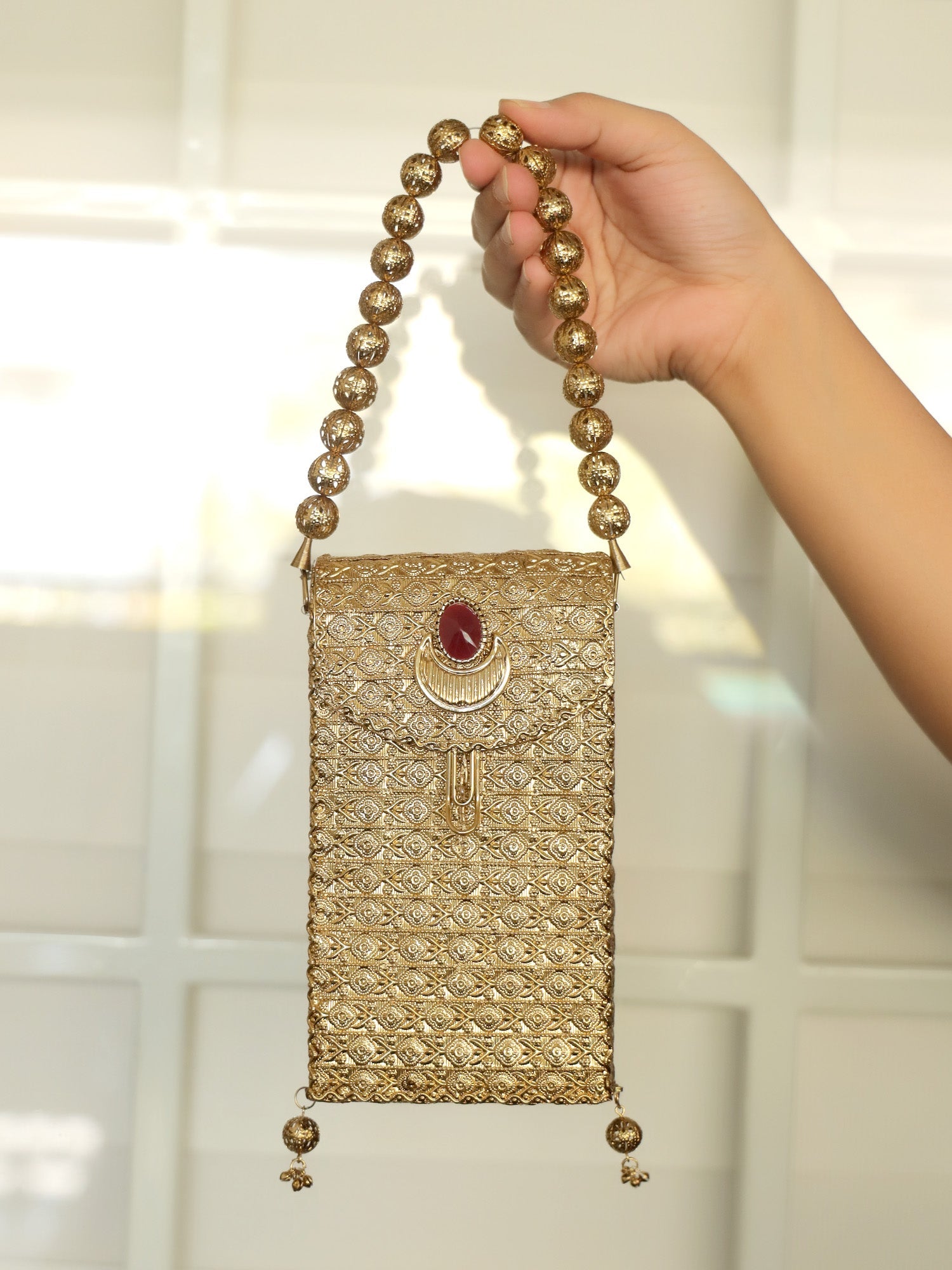 Kiran Ruby Golden Mobile Pouch - qivii