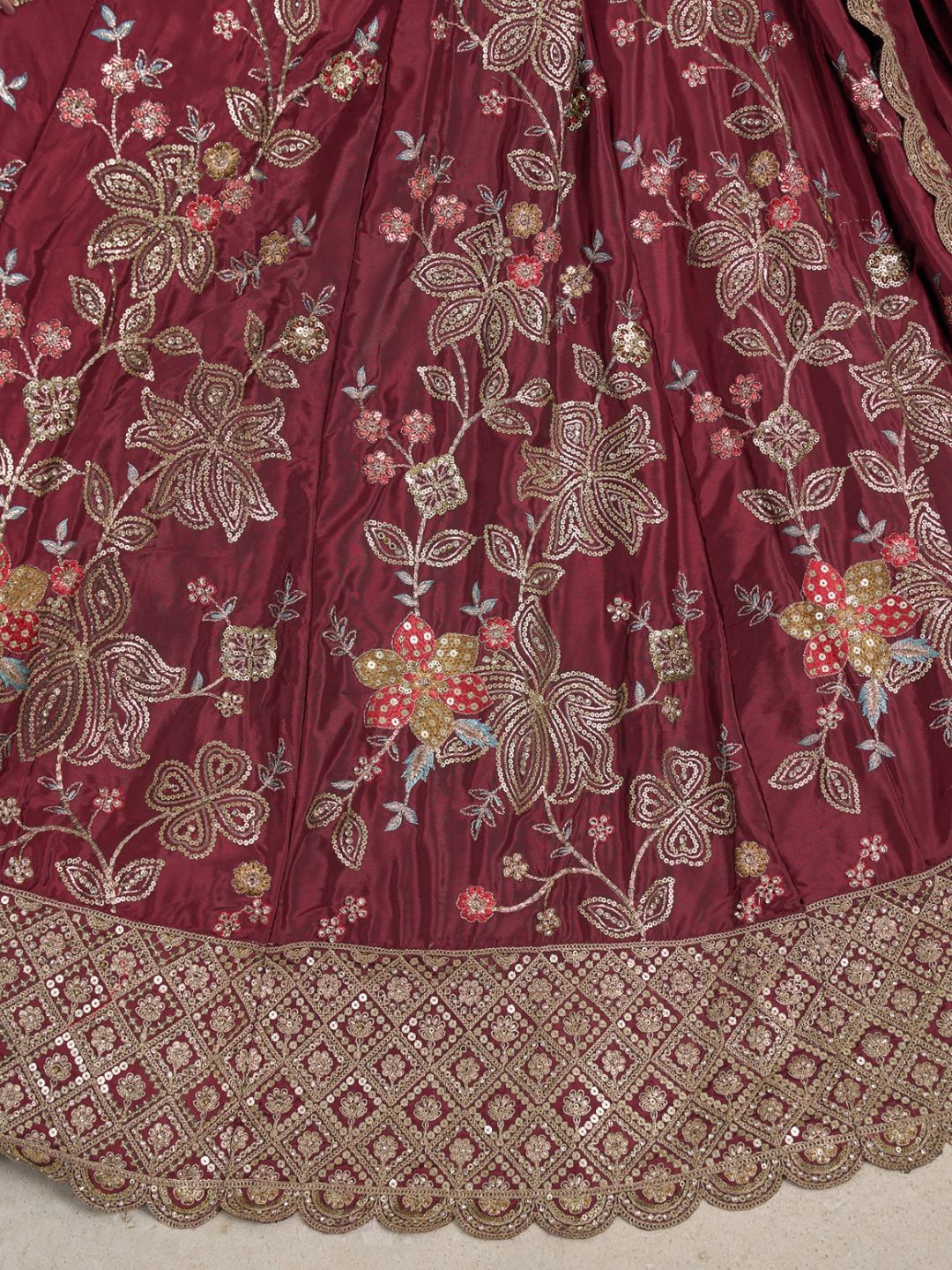 Stylish Maroon Lehenga Choli with Rich Golden Floral Craftsmanship