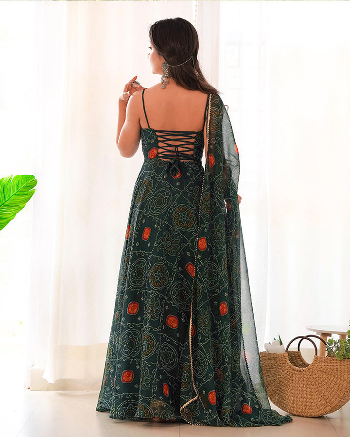 Qivii's elegant Anarkali gown in dark green with a soft chiffon fabric