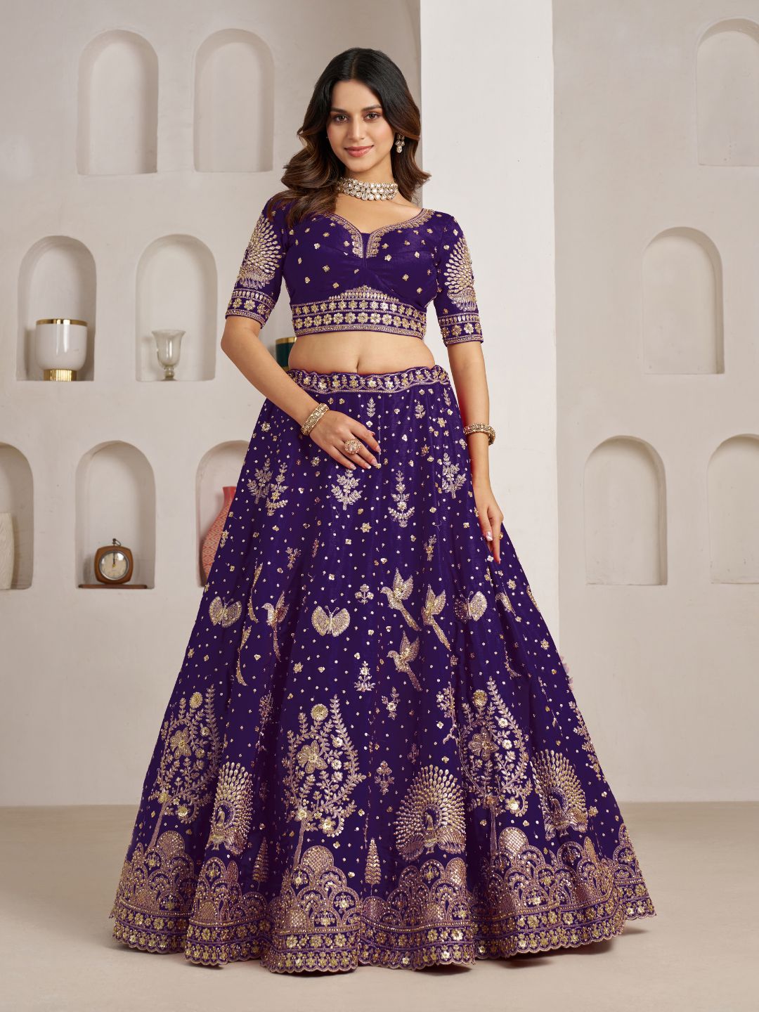 Luxurious Purple Lehenga Featuring Intricate Floral and Bird Designs