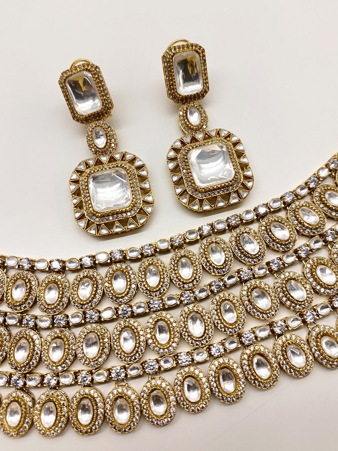 Pankhudi Triple Layerd Kundan Polki Necklace Set