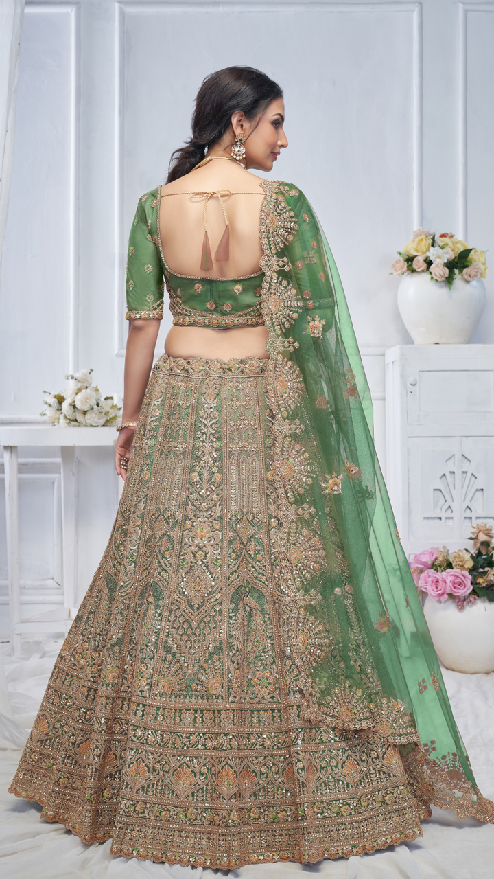 Royal Grandeur bridal  Green Mehendi Lehenga with Paisley and Peacock Motifs & Heavy Embroidery