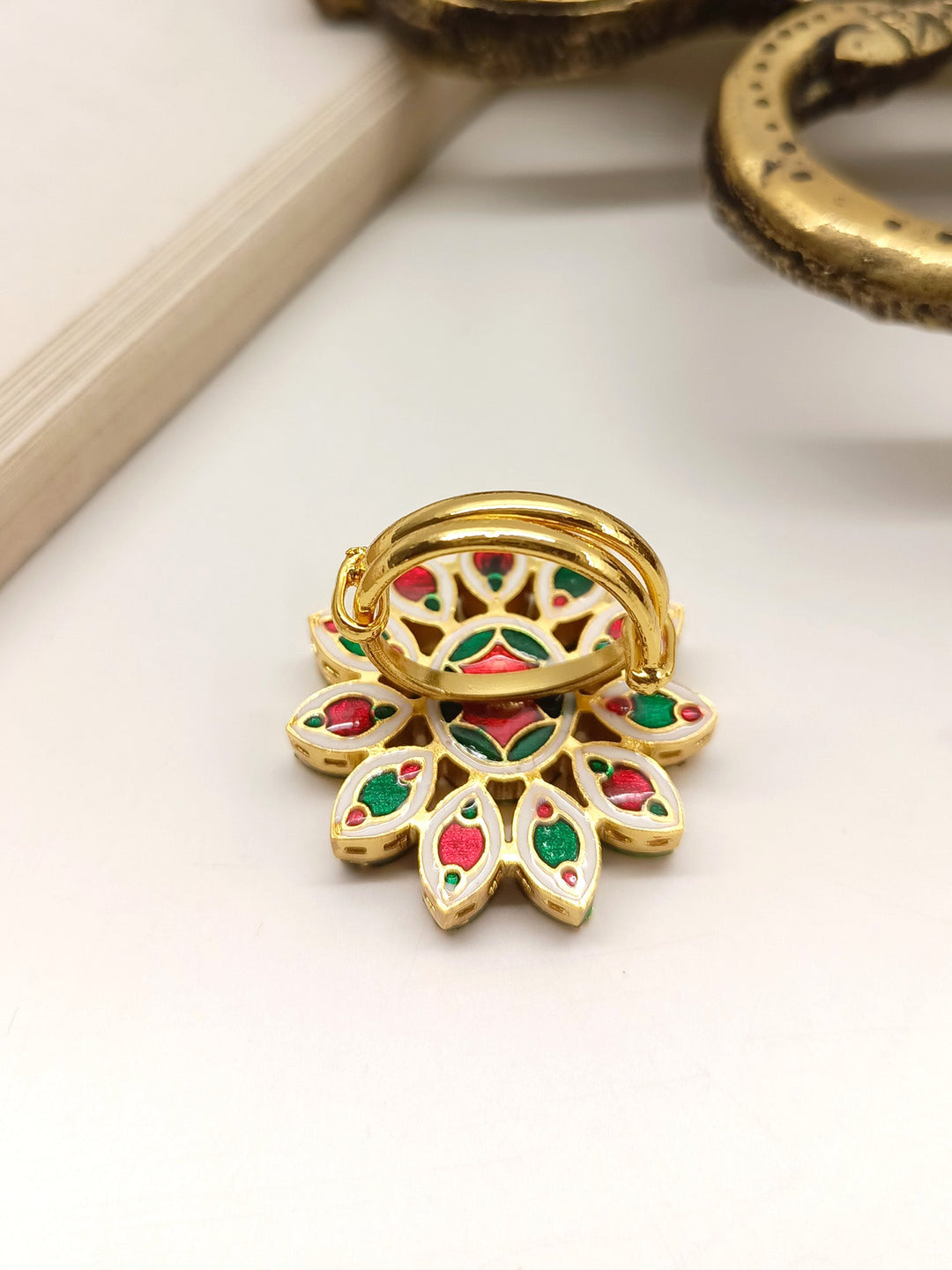 Beautiful Jaspinder Green Kundan Finger Ring with intricate gold detailing and sparkling gemstones 