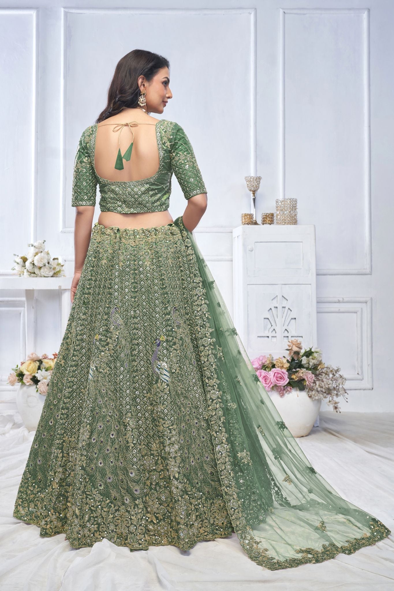 Graceful Green Bridal Wear Lehenga with Elegant Detailing - qivii