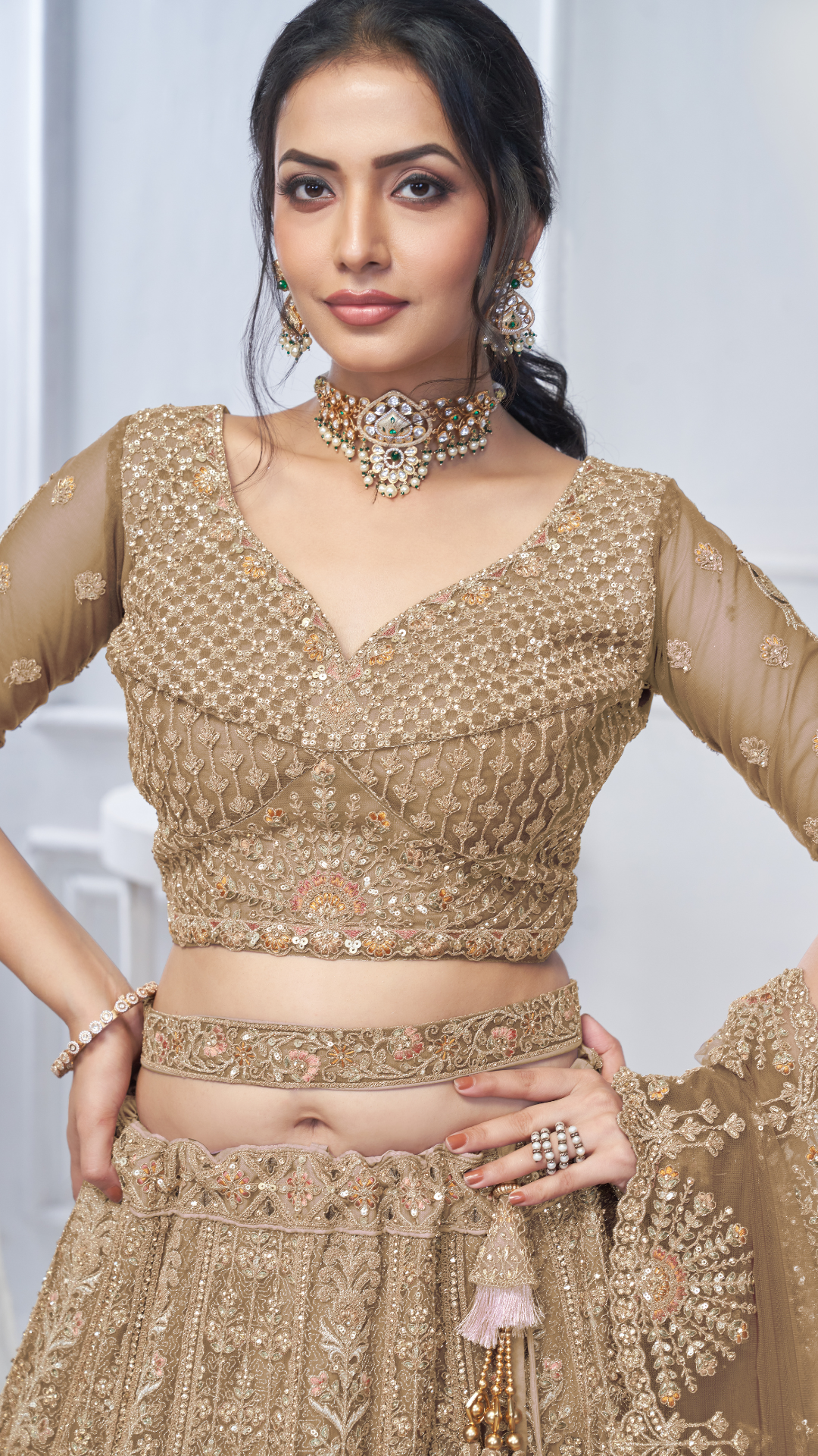 Royal Grandeur bridal Brown Lehenga with Paisley and Peacock Motifs & Heavy Embroidery