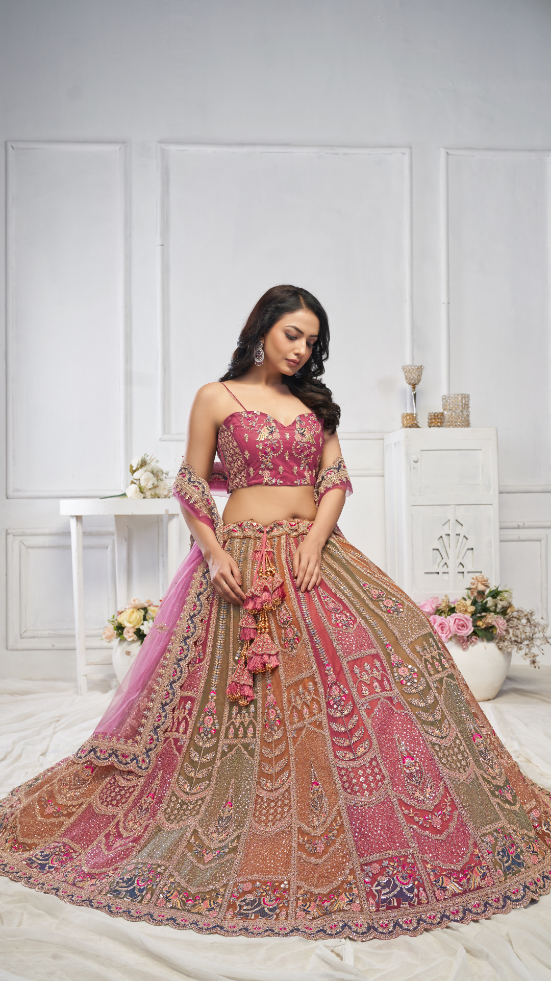 Majestic Multi-Color Zari Weaving Net Lehenga Choli With Dupatta