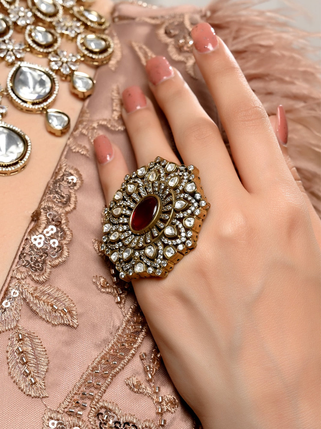 Beautiful maroon Victorian finger ring with intricate floral detailing and elegant design