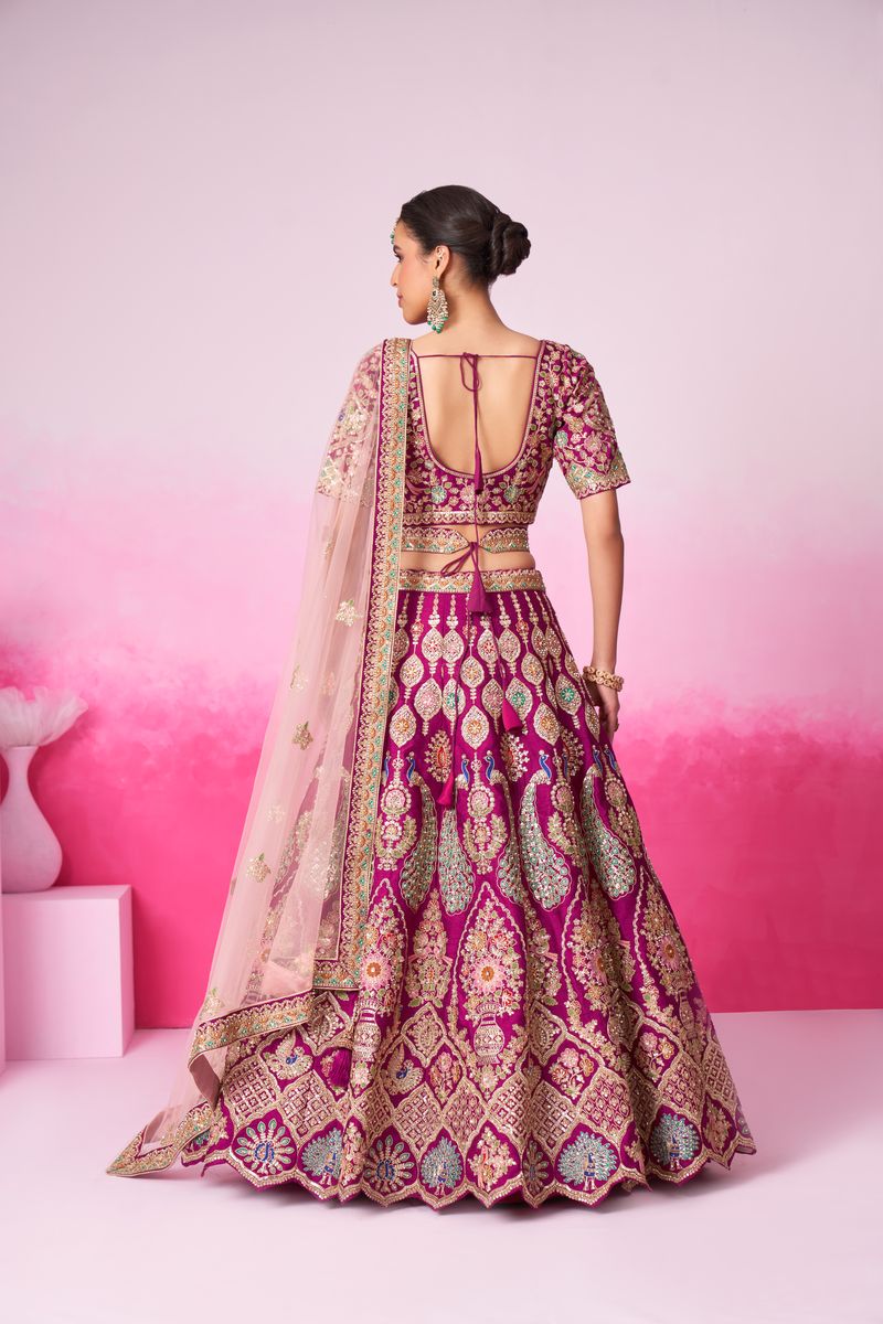 Burgundy - Pure Silk Fully Embroidered Using Moti, Sequin & Multicolor Thread Bridal Semi Stitched Lehenga with Double Dupatta is a luxurious and stunning outfit perfect for a bride's special day