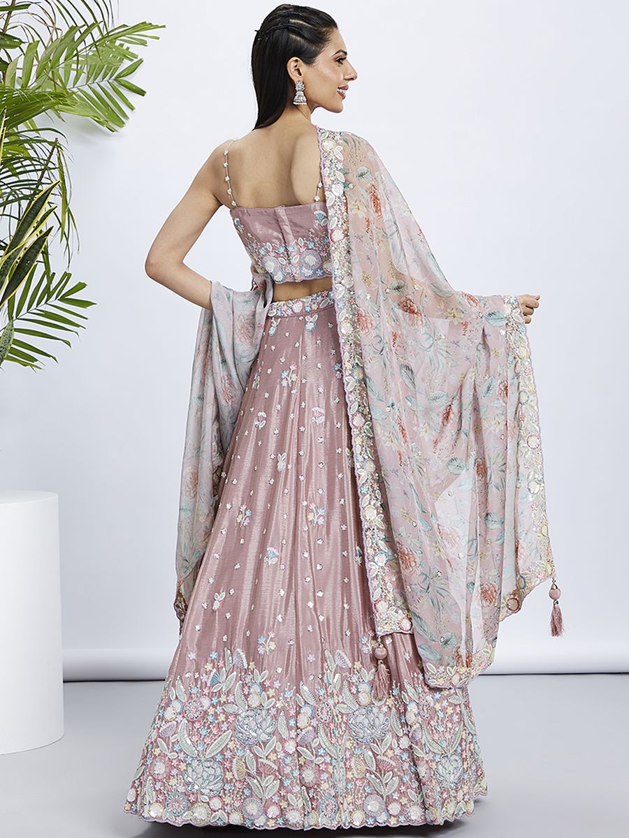 Gorgeous rose gold lehenga choli with intricate sequins and embroidery