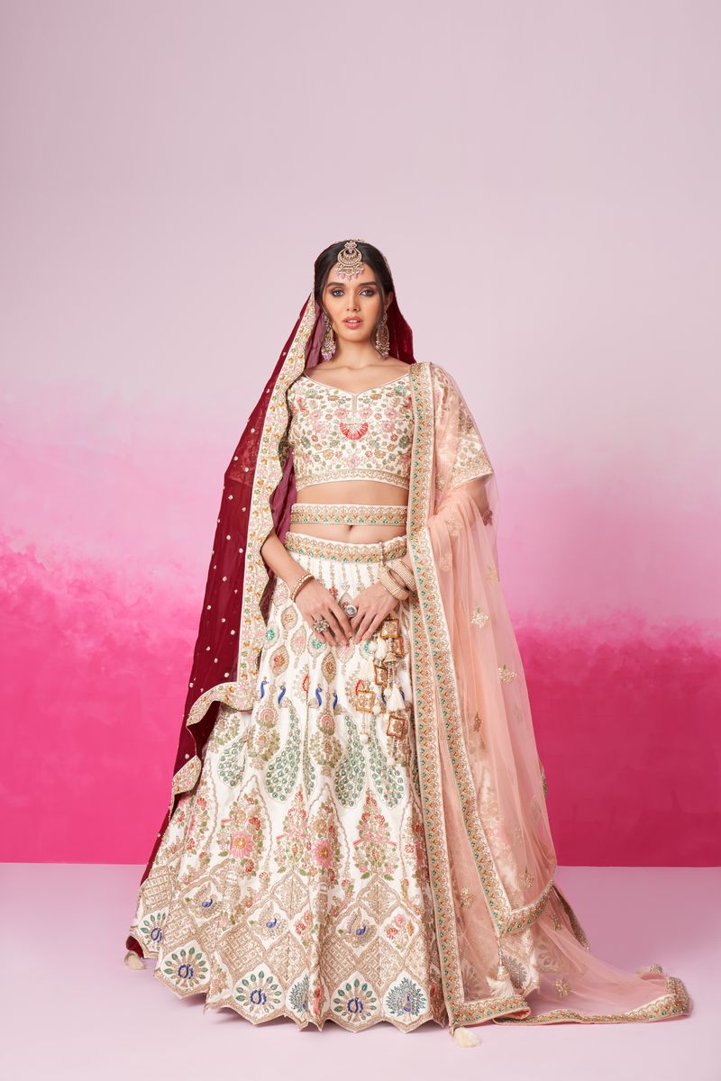 Cream lehenga with moti, sequin and multicolor thread embroidery