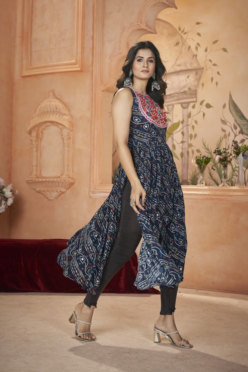 Blue rayon top with intricate embroidered work and printed design on the front