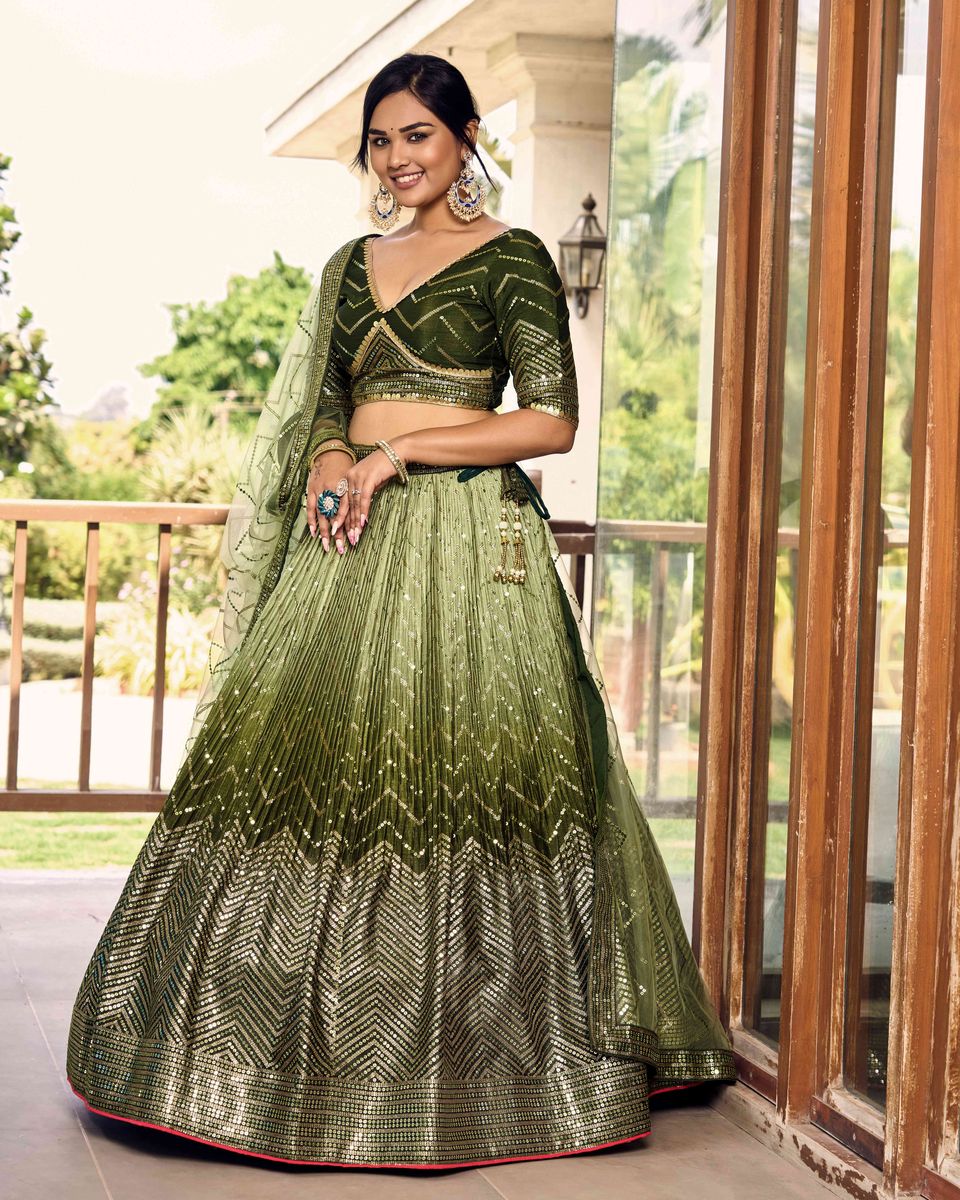 Beautiful green lehenga choli with intricate sequins and thread work