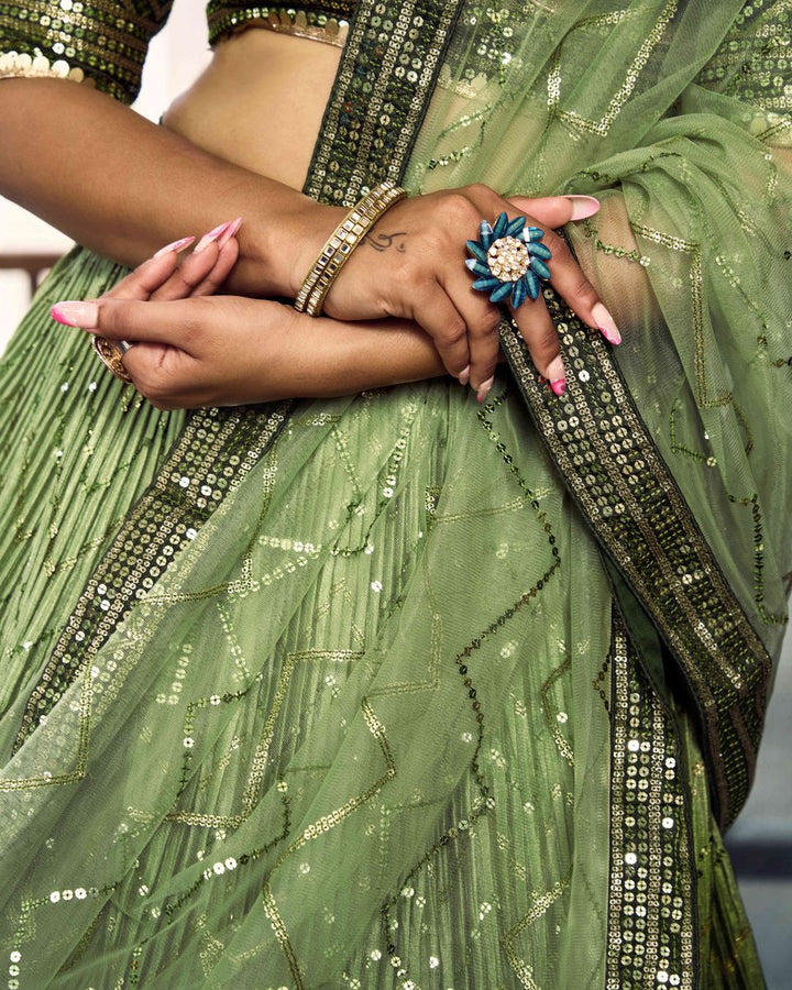 Close-up of green sequins embroidery on traditional lehenga choli