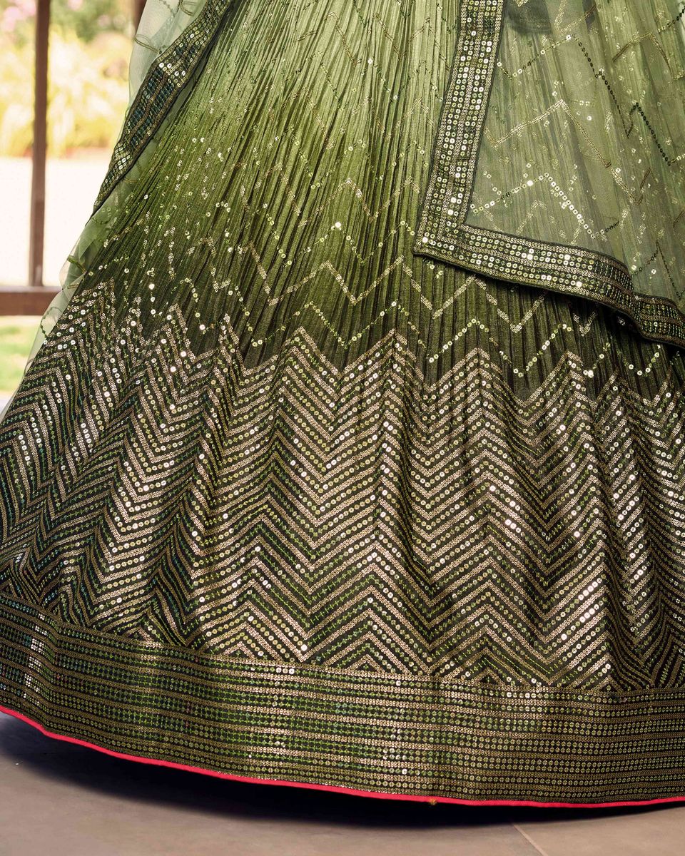 Exquisite green lehenga choli showcasing intricate sequins thread work