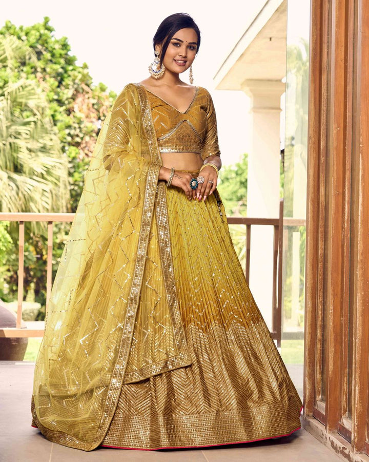 YELLOW SEQUINS THREAD EMBROIDERY WORK LEHENGA CHOLI