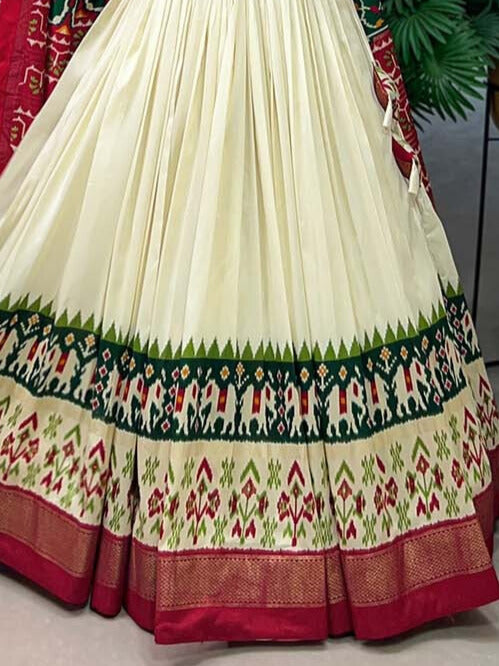 Tussar Silk Patola Print With Foil Printed Silk Lehenga Choli In Green Color