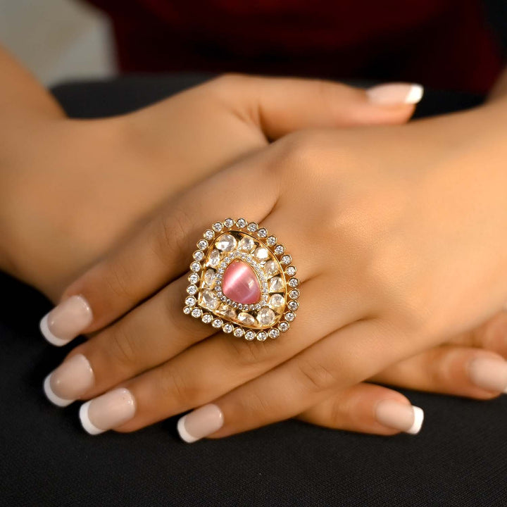 Close-up of Gopika Baby Pink Gold Plated Kundan Ring with intricate design and sparkling stones