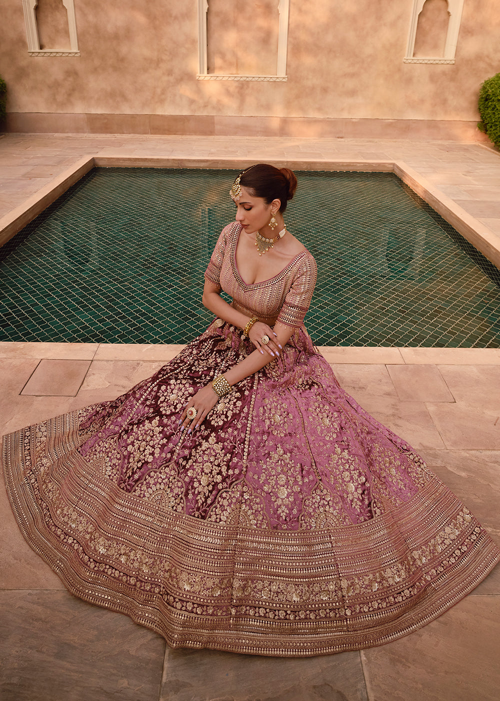 Close-up of the fully embroidered work on the pink Viscose Lycra Silk Lehenga Choli