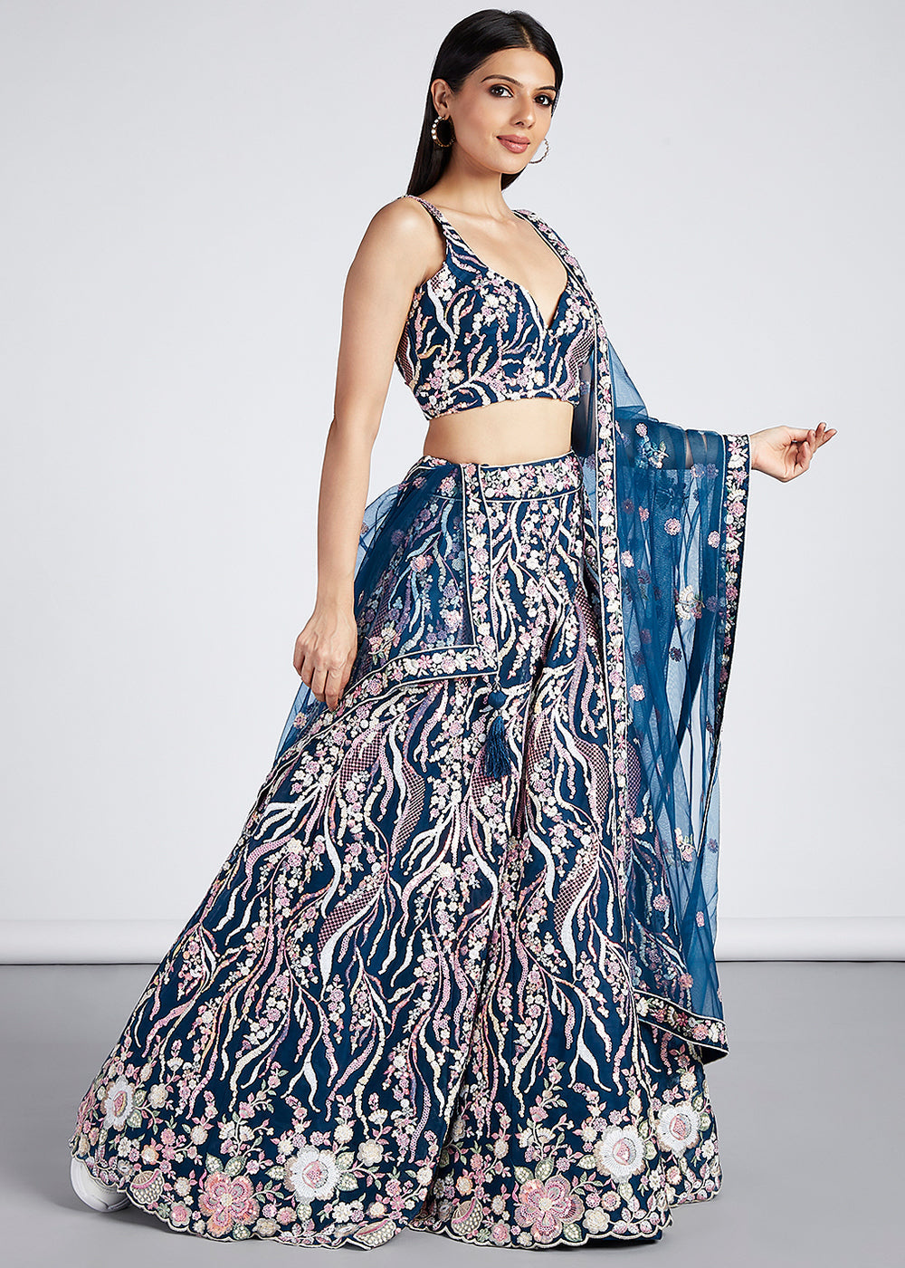 Traditional navy blue lehenga choli with sequins and thread work