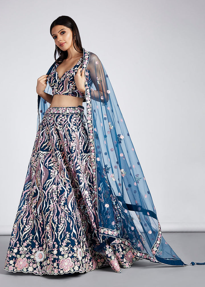 Beautiful sequin and thread work on navy blue net lehenga choli