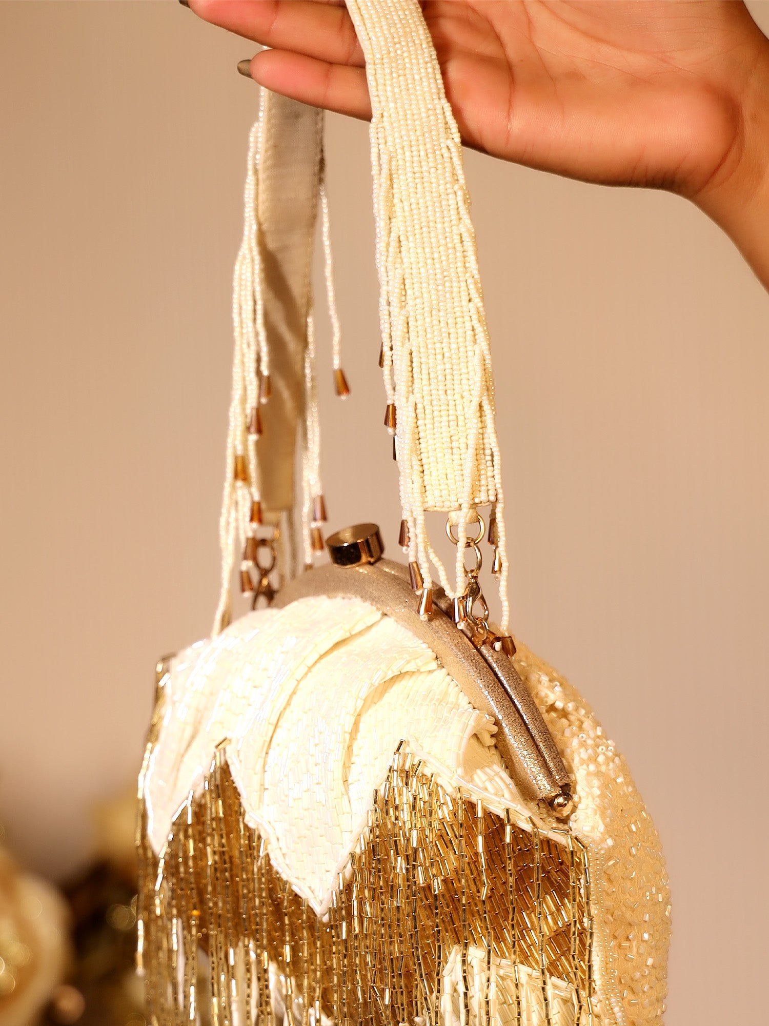 Shezana Cream Potli Bag - qivii