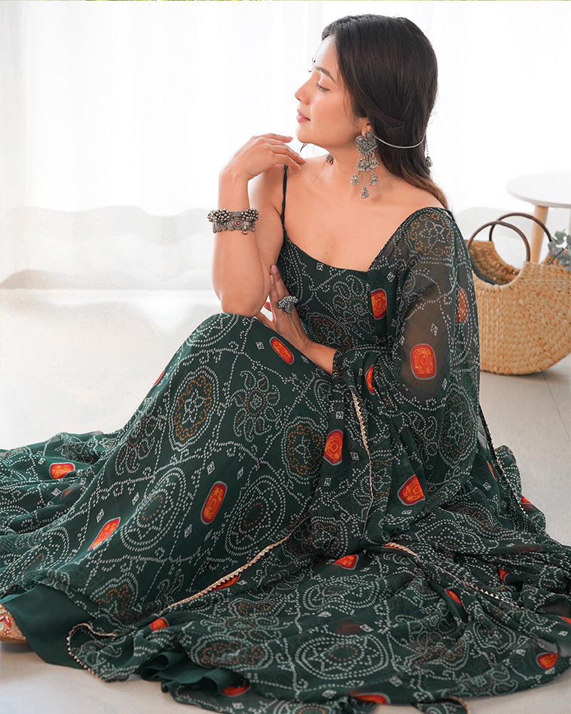 Beautiful Anarkali gown with intricate floral bandhani print in dark green