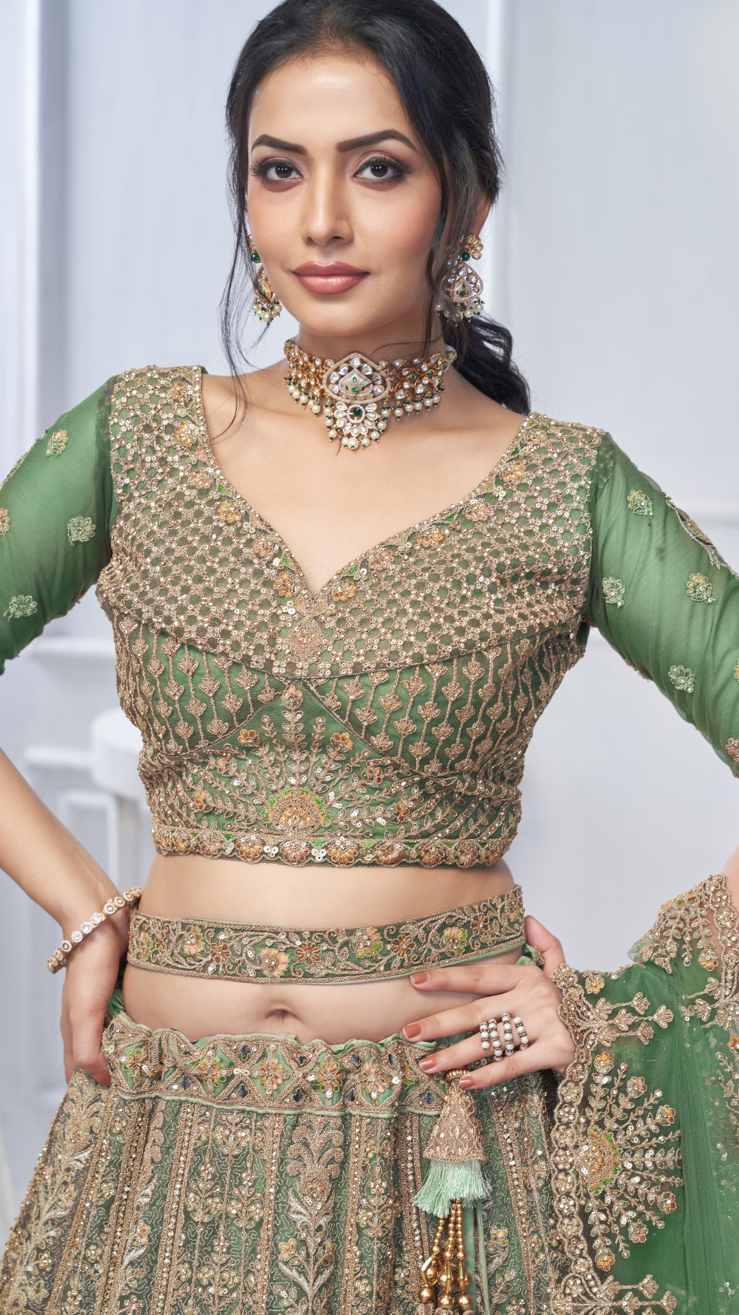 Royal Grandeur bridal  Green Mehendi Lehenga with Paisley and Peacock Motifs & Heavy Embroidery