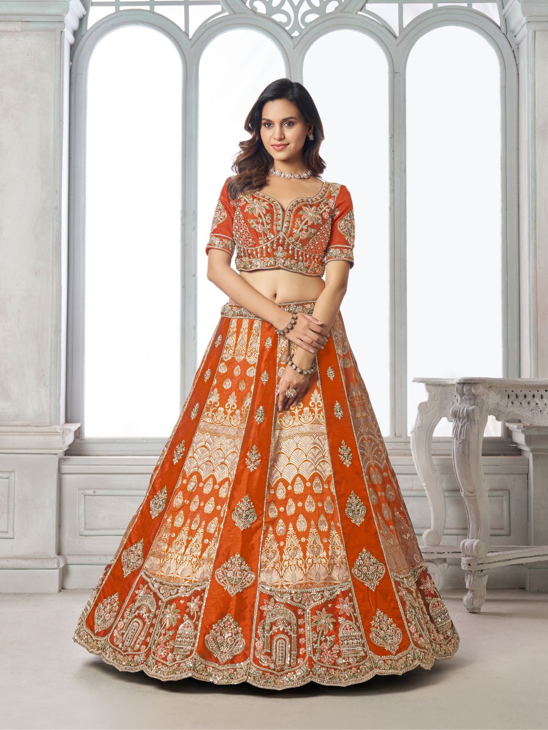Elegant Rust Lehenga Featuring Rich Raw Silk and Artisan Craftsmanship