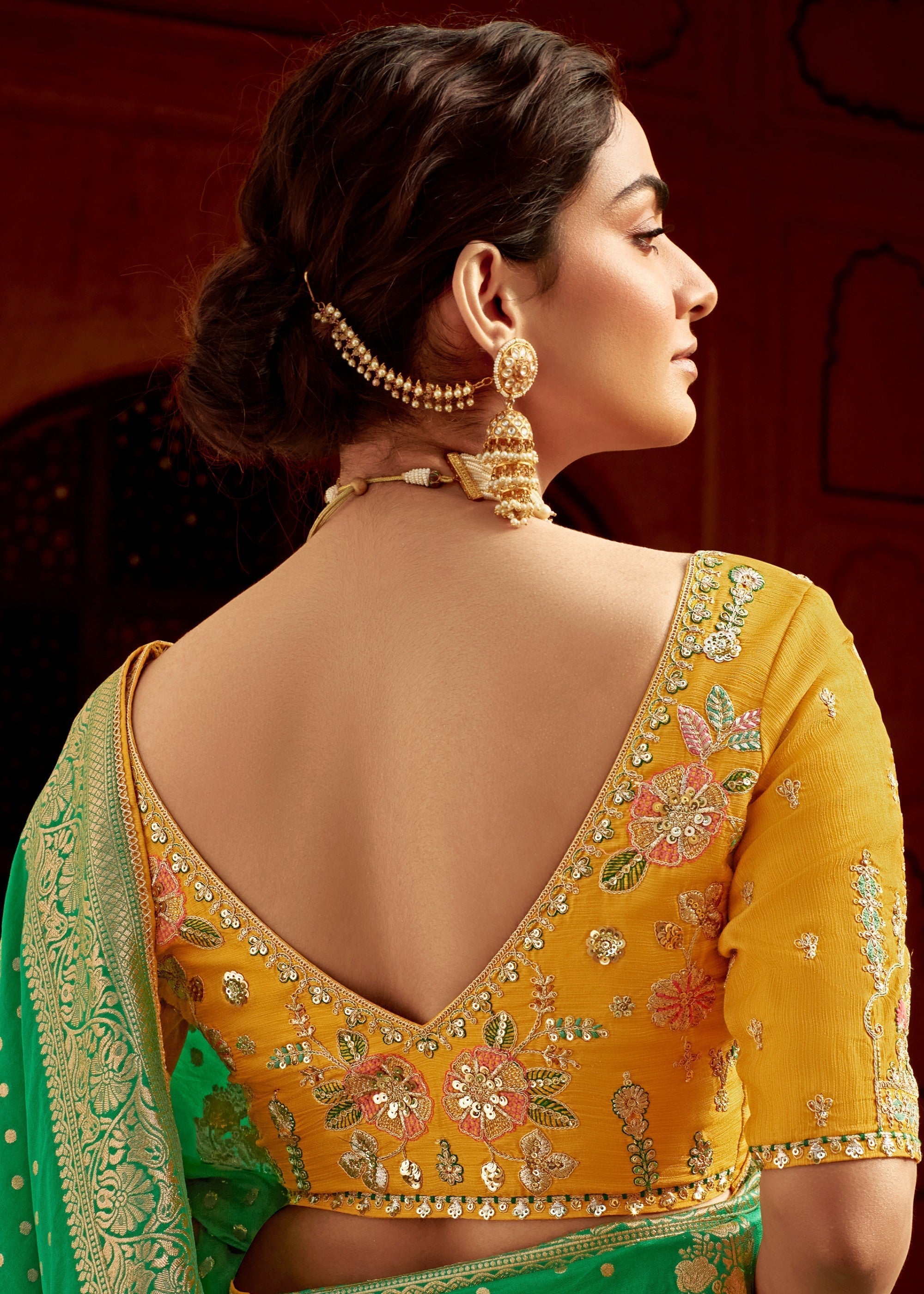 Emerald Green Dola Silk Saree Embellished With Weaving Work And Heavy Embroidered Blouse - qivii