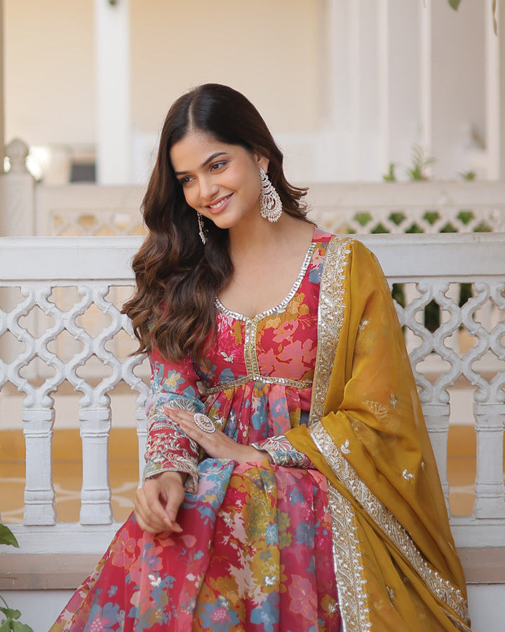 Beautiful red Alia cut gown with intricate floral embroidery and matching dupatta by Qivii for a stunning wedding wear look