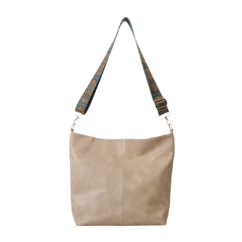 Women's Convertible Crossbody Bucket — Monochrome PU Carryall with Artisan-Embroidered Strap