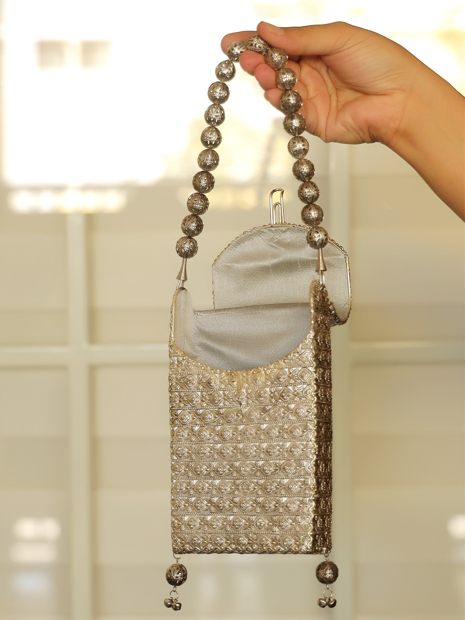 Kangna Ruby Silver Mobile Pouch - qivii