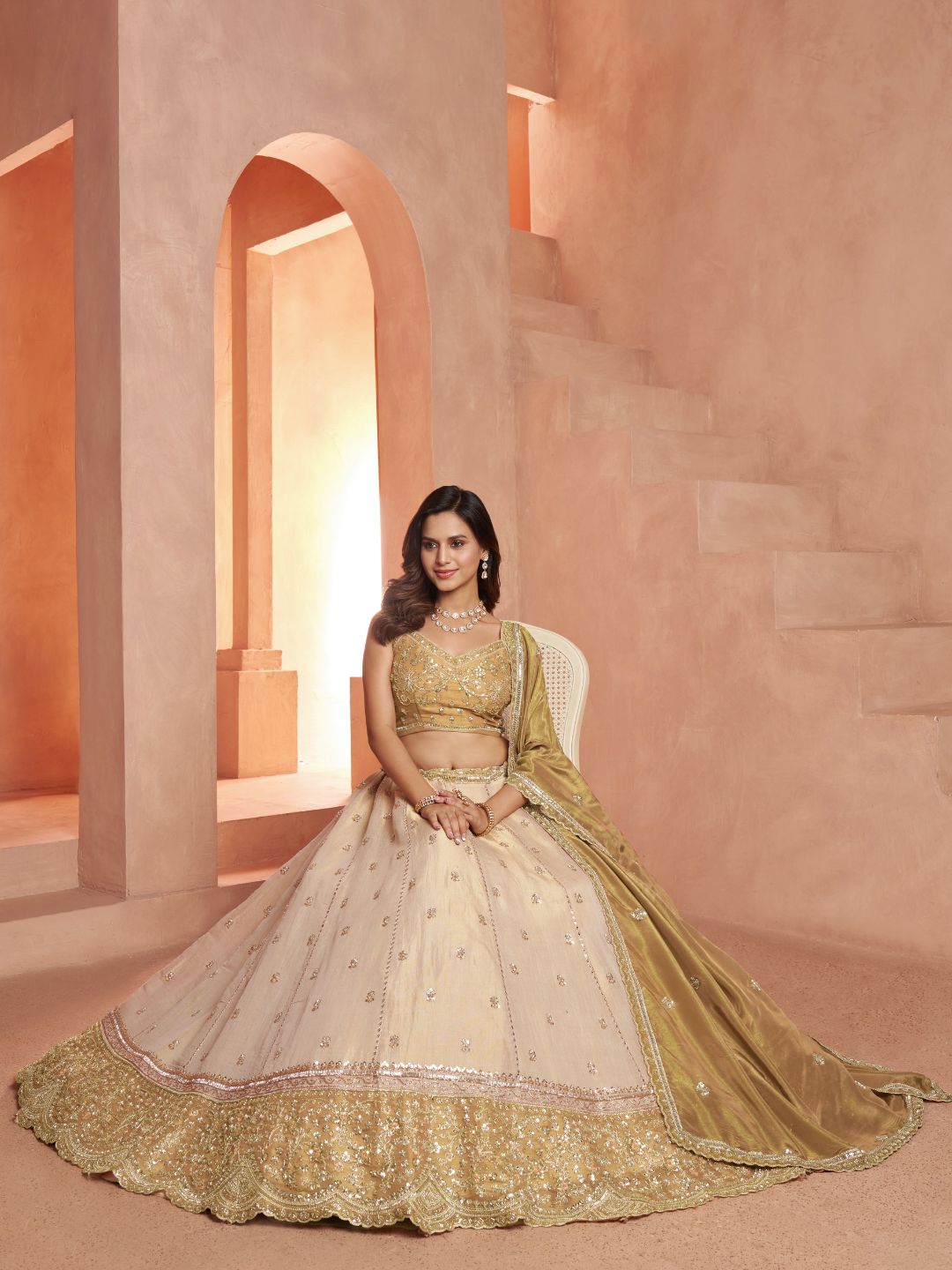 Graceful Gold Lehenga Featuring Handcrafted Embroidery