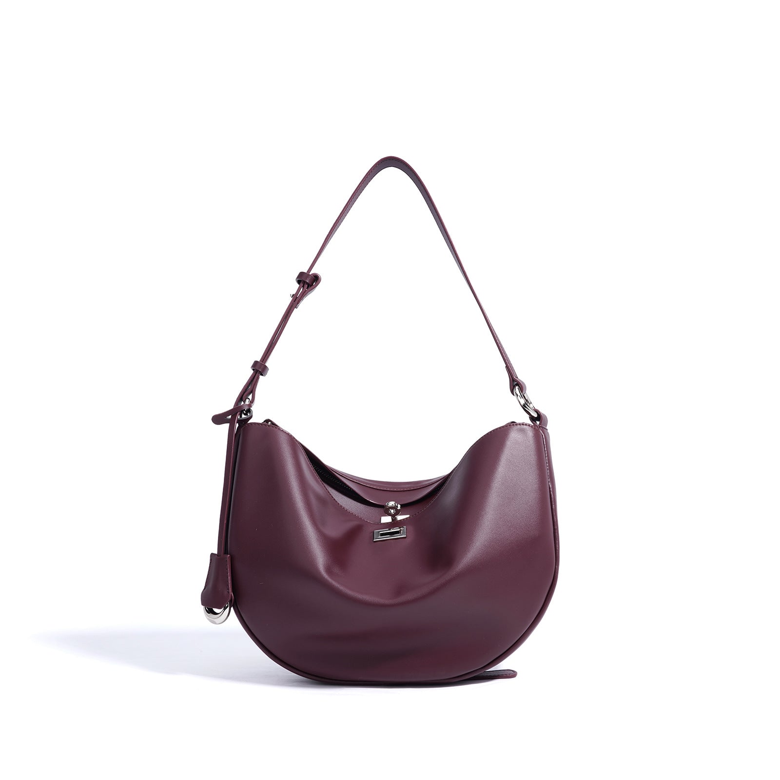 Women's Hush Rider Bucket — Genuine Leather Saddle Bag with Signature Lock Fastening & Convertible Shoulder Strap