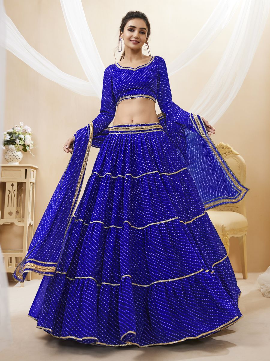  Stunning leheriya print lehenga with delicate lace work in blue color 