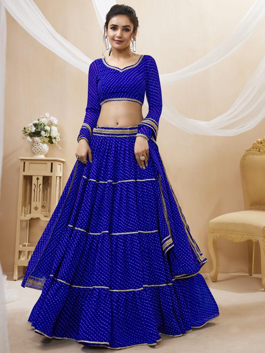 Beautiful blue georgette leheriya printed lehenga with intricate lace detailing 