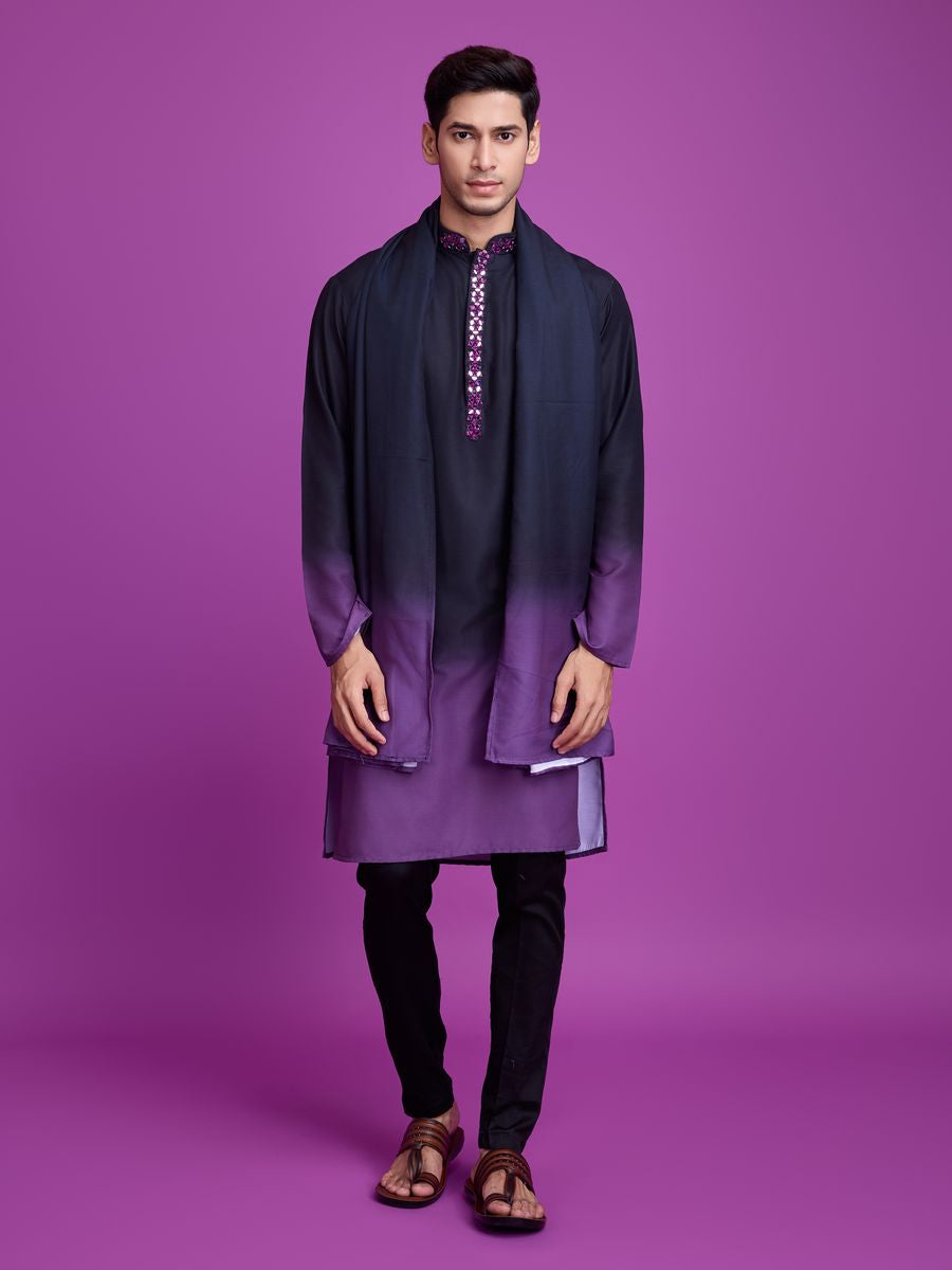  Close-up of the hand mirror work detailing on the black and dusty purple kurta set