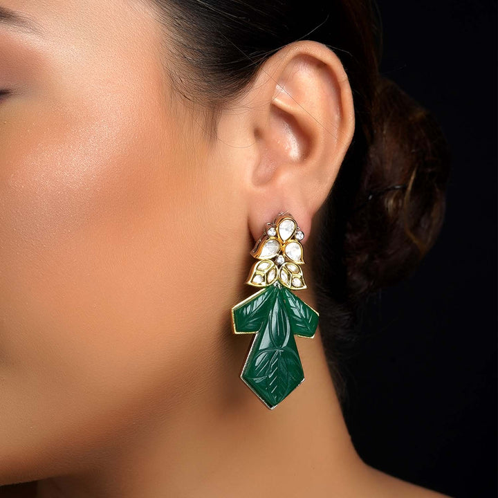 Diya Green Rhodium Plated Carved Stone Kundan Earrings