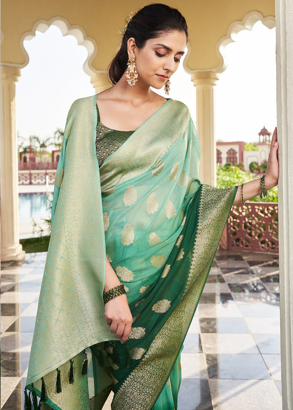 Shades Of Green Zari Woven Georgette Saree - qivii