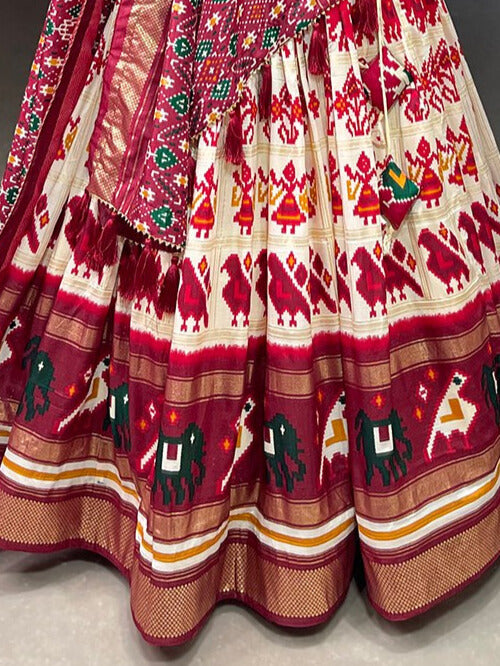 Tussar Silk Patola Print With Foil Work Lehenga Choli In Off White Color