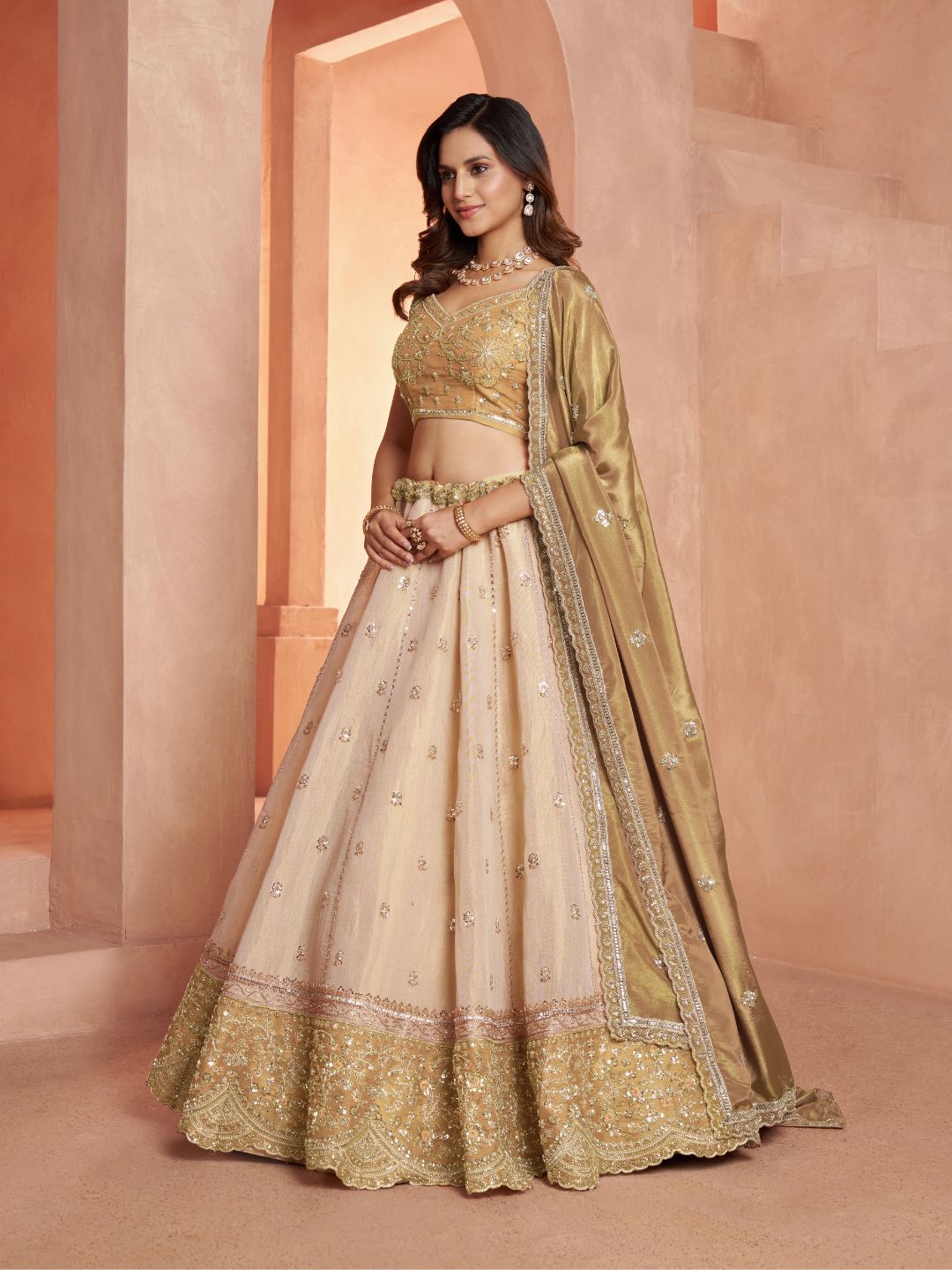 Graceful Gold Lehenga Featuring Handcrafted Embroidery